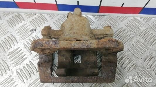 Суппорт тормозной задний левый hyundai tucson JM