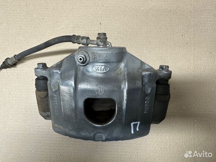 Суппорт передний правый Kia Cerato 1(LD)