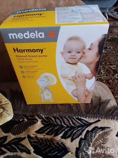 Молокоотсос medela ручной
