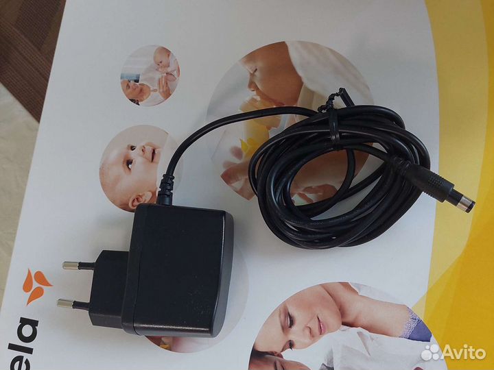 Молокоотсос medela электрический