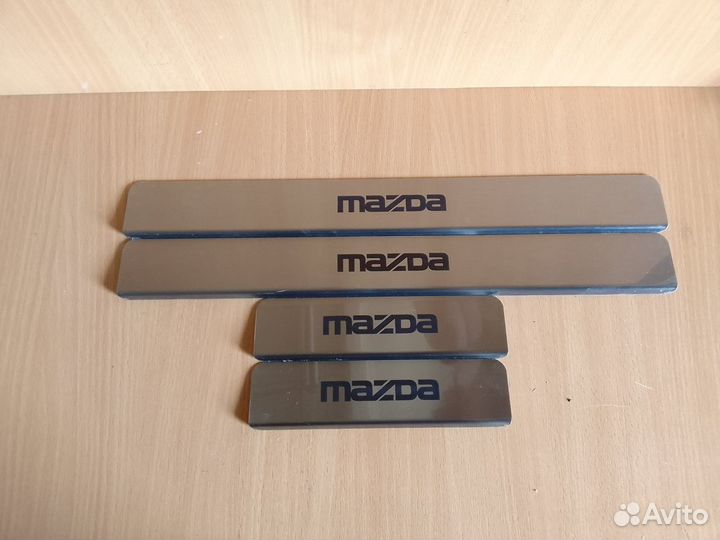 Накладки на пороги Mazda (нержавейка)