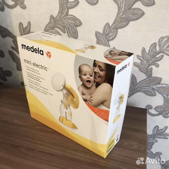 Молокоотсос medela электрический