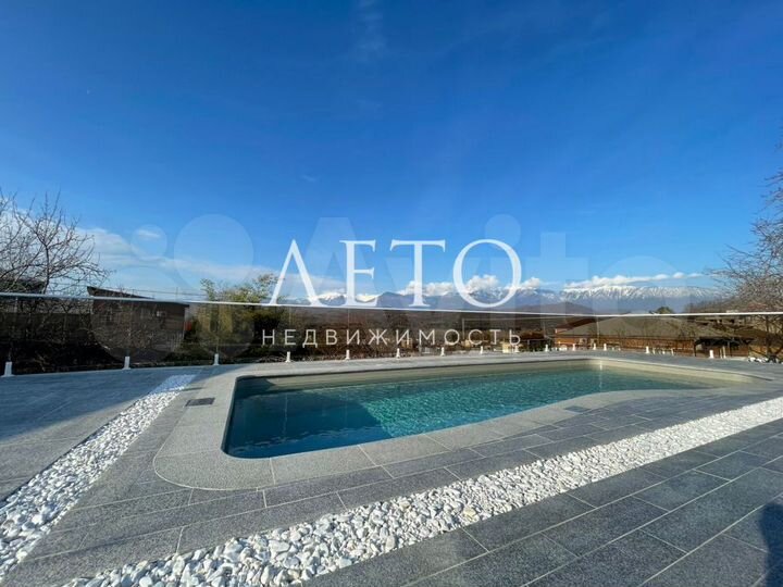 Коттедж 420 м² на участке 9 сот.