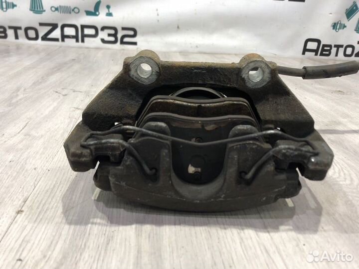 Суппорт тормозной передний левый Volkswagen Polo 6