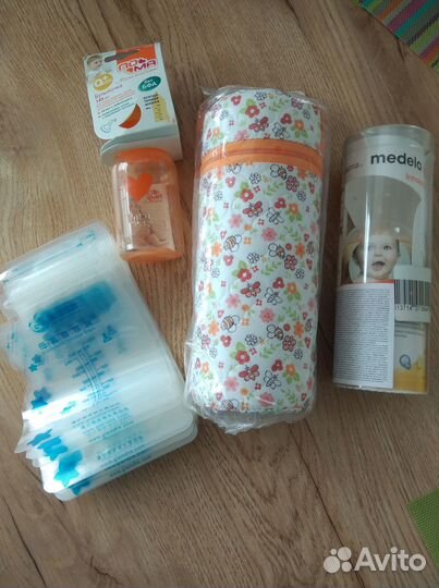 Ручной молокоотсос medela, бутылочка calma