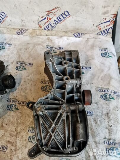 Кронштейн генератора Nissan Almera G15 (2012—2018)