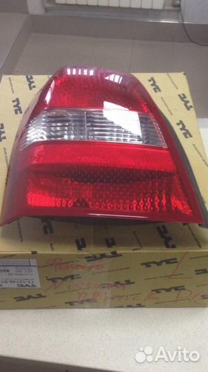 Фонарь задний левый Nissan primera p12