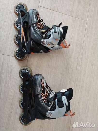 Роликовые коньки