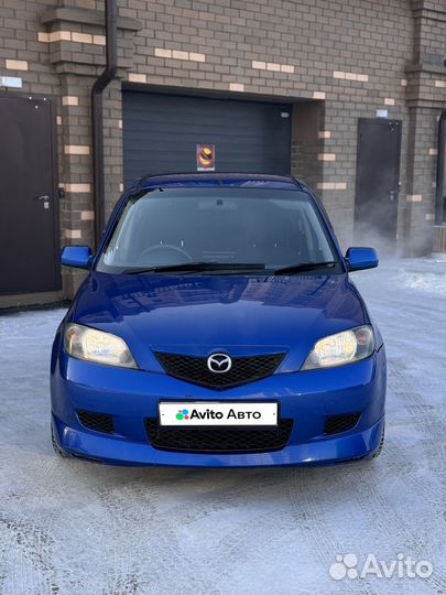 Mazda Demio 1.4 AT, 2003, 150 000 км