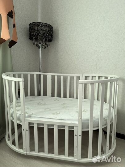 Детская кроватка круглая (овальная) с маятником