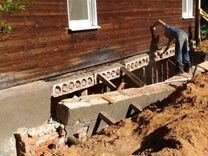 Заливка, ремонт фундамента и подъем дома