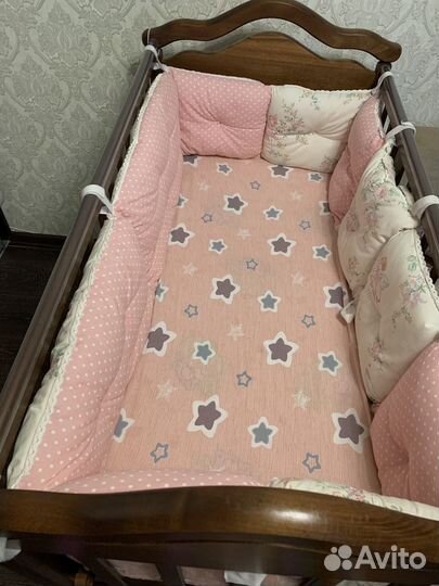 Детская кроватка с продольным маятником