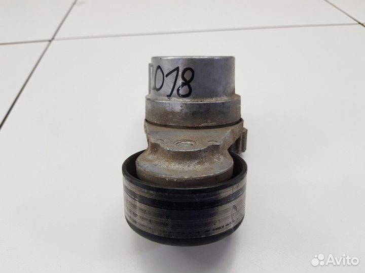 Натяжитель ремня (Opel Astra)