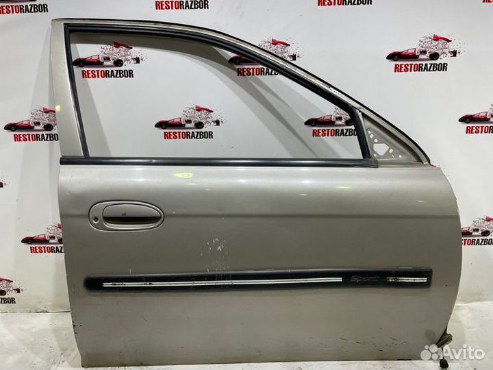 Дверь боковая передняя правая Kia Spectra седан