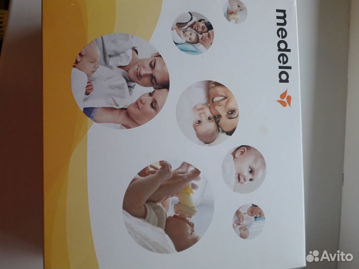 Молокоотсос medela электрический