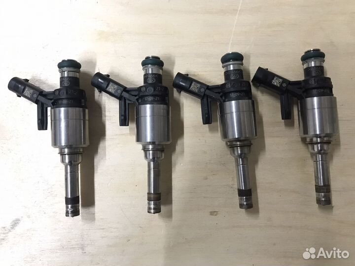 Топливная форсунка 06L906036J Passat B8