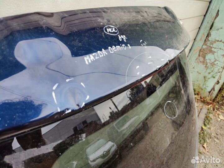 Крышка багажника Mazda Demio 4