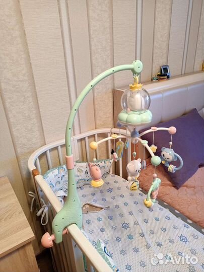 Музыкальный мобиль на кроватку