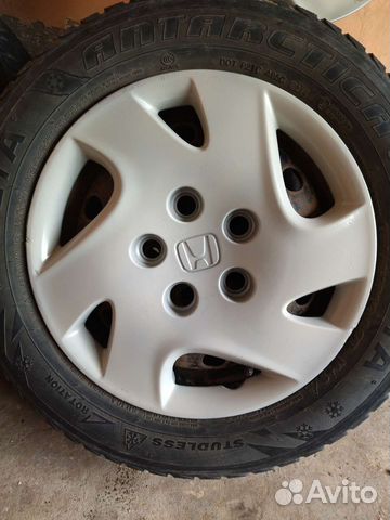 Продам б/у зимние шины штампы + колпаки