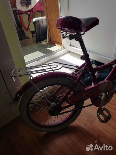 Продам детский велосипед с боковыми колесами