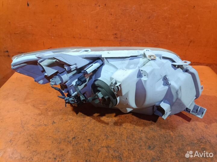 Фара левая Toyota Corolla fielder NZE144G