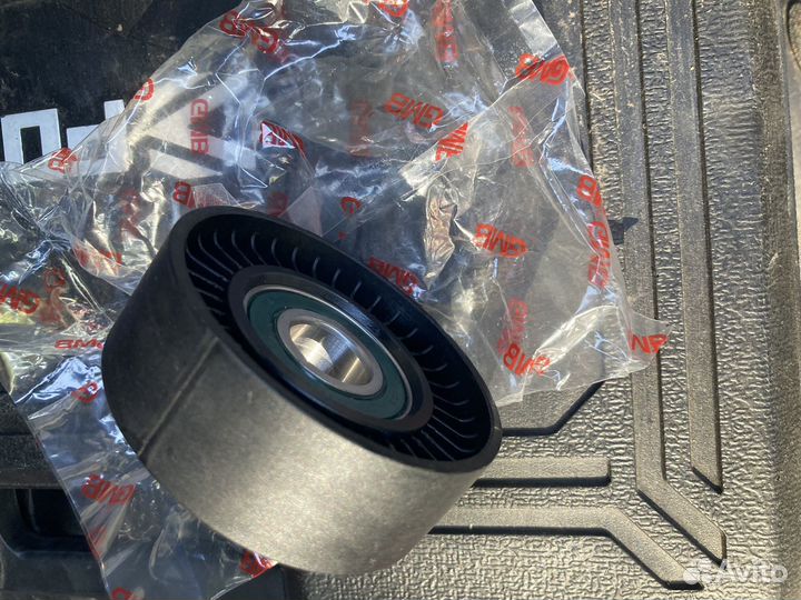 Натяжной ролик ремня генератора