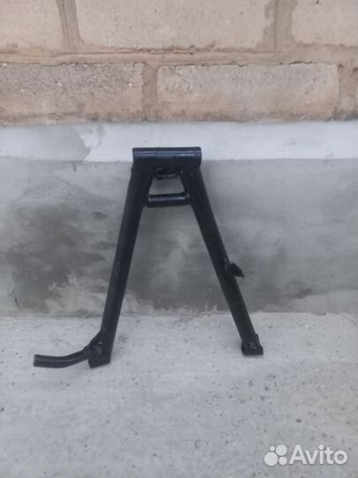 Подножка центральная