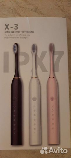 Электрическая зубная щетка