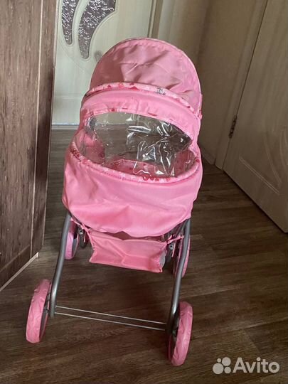 Игрушечная коляска для кукол