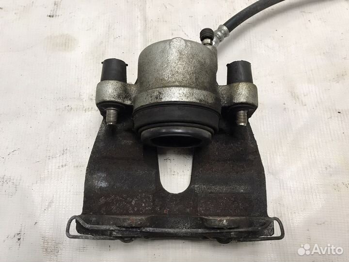 Суппорт передний правый Mazda 3 BL 1.6