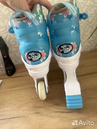 Продам регулируемые роликовые коньки(30-33)