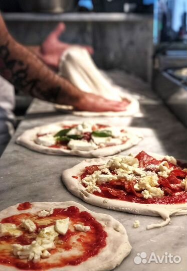 Повар пиццер