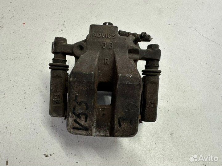 Тормозной суппорт задний правый Toyota Camry