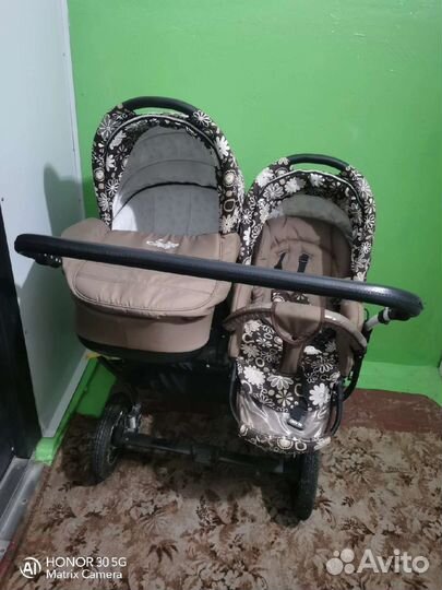 Коляска для погодок