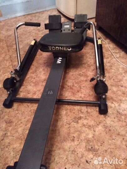 Гребной тренажер