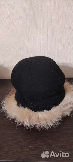 Женские меховые шапки