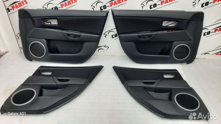 Обшивка двери Mazda 3 bk