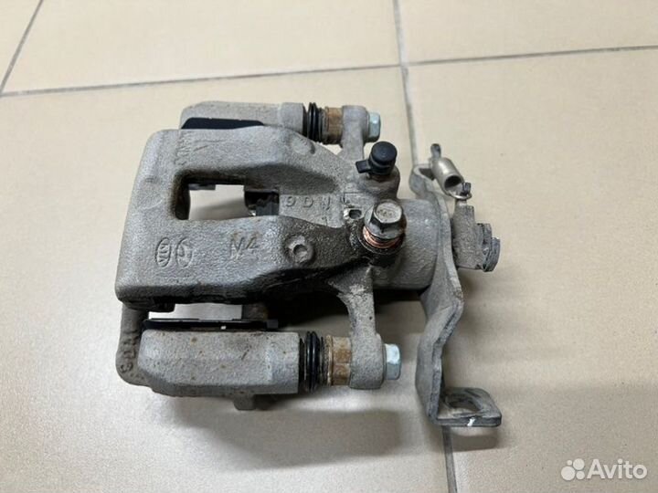 Суппорт тормозной задний левый Kia Soul 29000км