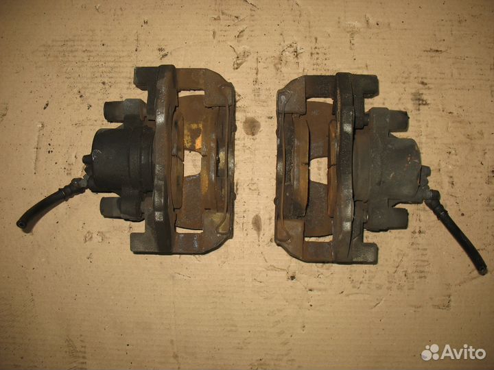 Суппорт тормозной передний Mazda 3 BL