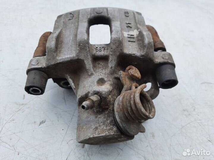 Суппорт задний левый Форд Фокус 2