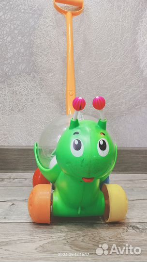 Игрушка каталка