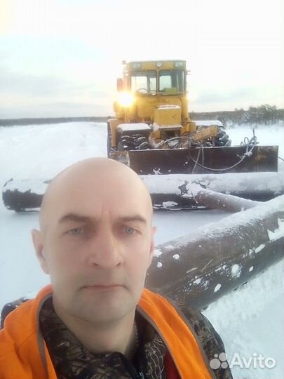 Машинист трактора к700