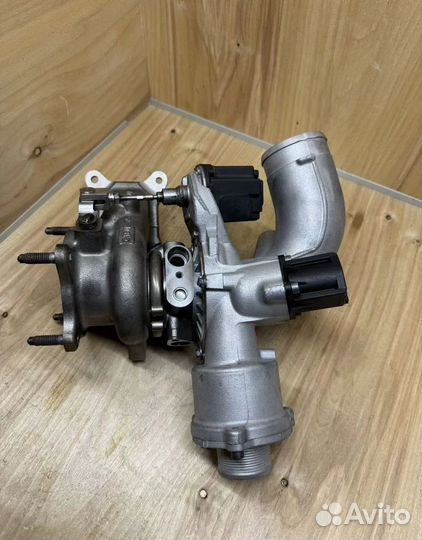 Турбина Audi 06L145701