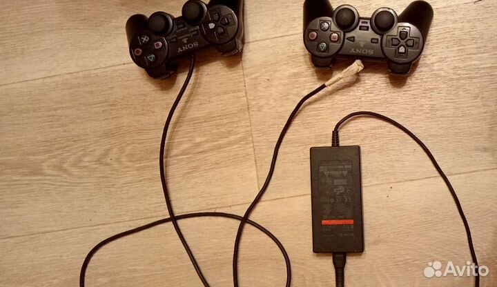 Игровая приставка Sony PlayStation 2 Slim, черный