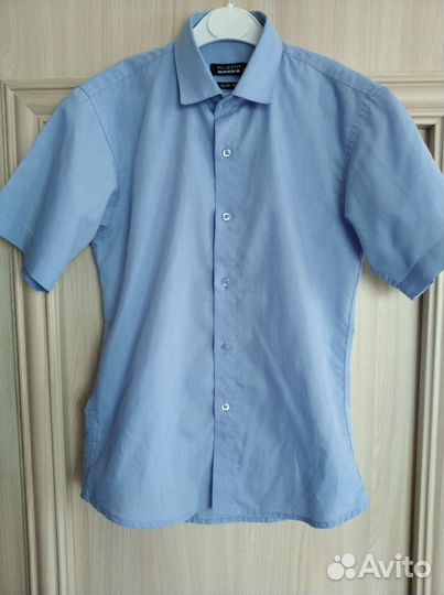 Рубашка на мальчика голубая р140