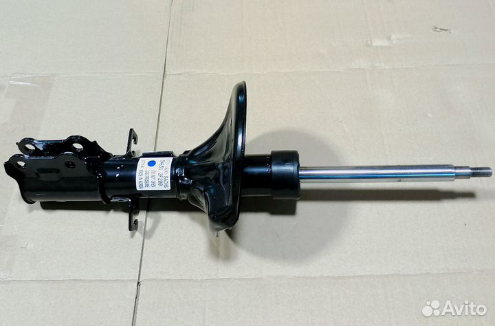 Амортизатор передний левый Церато Kia Cerato