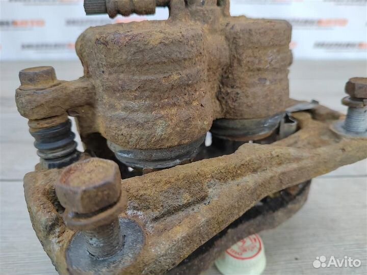 Суппорт передний правый subaru Forester 3 SH