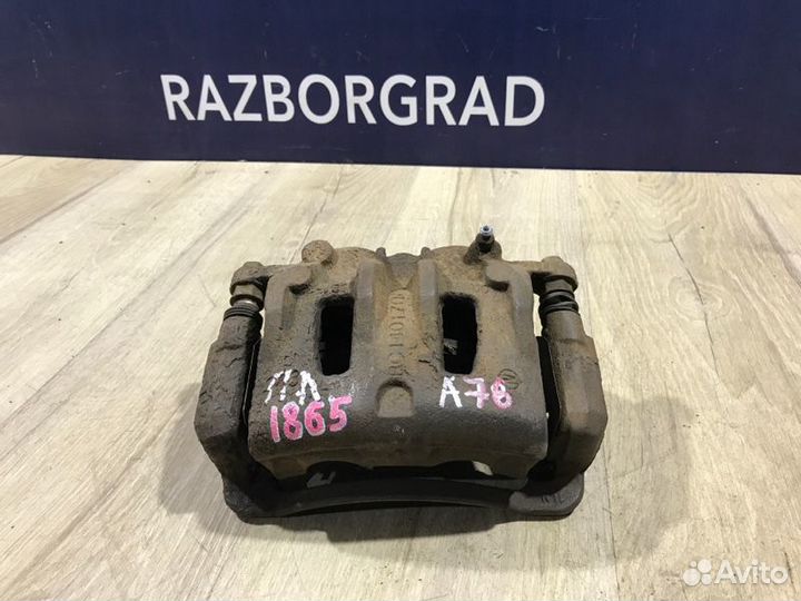 Суппорт передний левый Ssangyong Korando C200 2.0