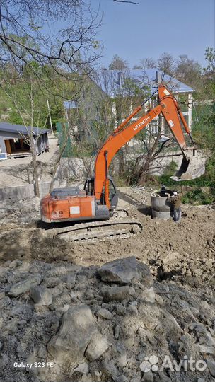 Услуги гусеничного экскаватора