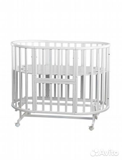 Детская кроватка с маятником